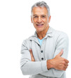 Happy senior man standing with arms crossed