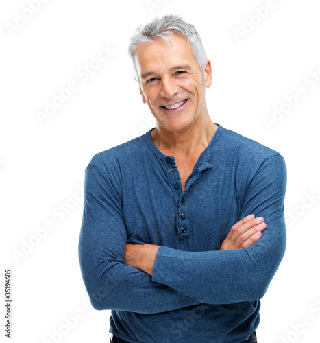 Photo: Portrait of smart senior man smiling on white Portrait of smart senior man smiling on white