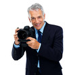 Senior business man holding professional Senior business man holding professional