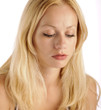 Pretty girl with long eyelashes looking down