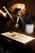 Hands using a blowtorch