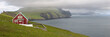 Red farmhouse on coast of Mykines, Faroe Islands Red farmhouse on coast of Mykines, Faroe Islands