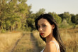 Photo: Portrait of a beautiful young girl at sunset Portrait of a beautiful young girl at sunset