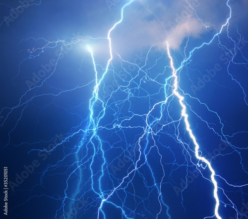 Photo: Heavy clouds bringing thunder, lightnings and storm. Heavy clouds bringing thunder, lightnings and storm.