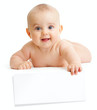 Adorable baby boy isolated holding paper sheet for your text
