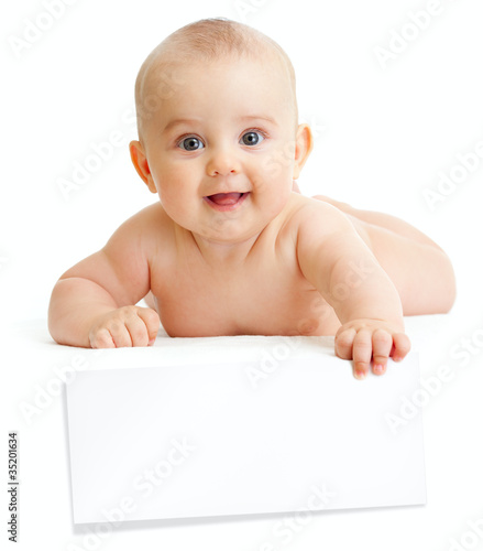 baby holding paper