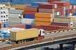 truck transports container to warehouse near the sea