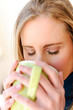 Photo: Woman with hot drink Woman with hot drink