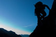 Silhouette of a climber with large copay space Silhouette of a climber with large copay space
