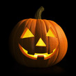 Illustration: Halloween - carved pumpkin glowing in the dark Halloween - carved pumpkin glowing in the dark