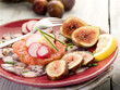 octopus carpaccio over grapefruit with figs and radish octopus carpaccio over grapefruit with figs and radish
