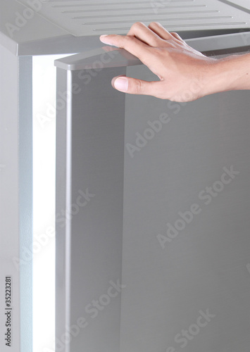 Photo: hand open freezer hand open freezer