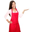 Foto: Small shop owner sales assistant showing Small shop owner sales assistant showing