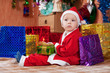 Boy dressed like Santa Claus