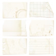 Old paper sheets - checked, lined, stained, with ornaments