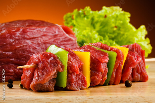 Photo: Raw beef on cutting board Raw beef on cutting board