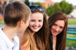 Portrait of three happy young teenagers