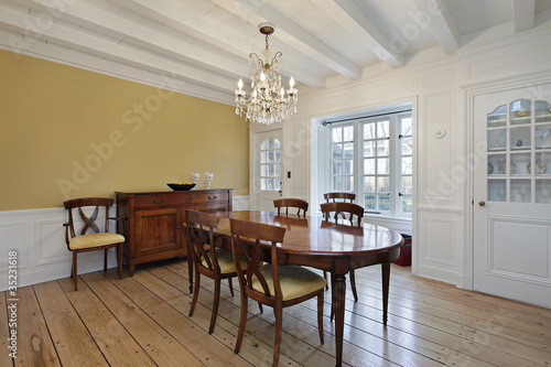 Photo: Dining room with white wood ceiling beams Dining room with white wood ceiling beams