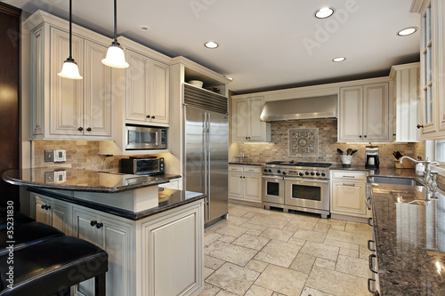 Photo: Upscale kitchen with breakfast bar Upscale kitchen with breakfast bar