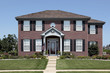 Brick home with arched entry