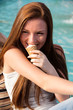 teen girl with ice cream in street