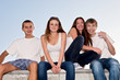 Portrait of three happy young teenagers