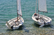 Two white small sailboads Two white small sailboads