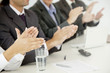 business people applauding