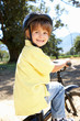 Little boy on country bike ride