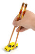 Toy car and chopsticks