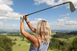 Images : Golferin beim Abschlag