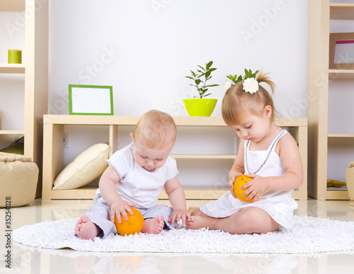 Photo: Toddlers Playing at home.Kids Toddlers Playing at home.Kids