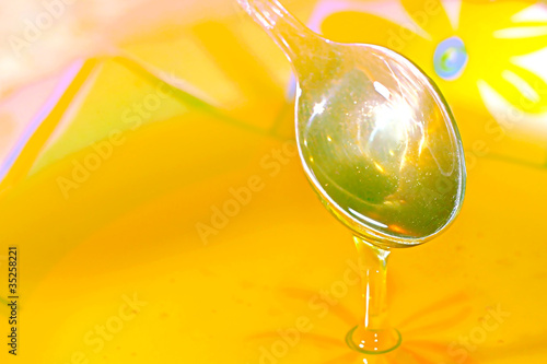 Photo: scene honey in plate as food background scene honey in plate as food background