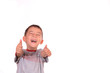 Boy showing thumbs up sign
