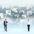 A young business couple on an abastract background A young business couple on an abastract background