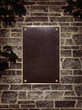 Sign in Metal Frame on a Wall Sign in Metal Frame on a Wall