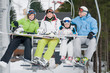 Ski lift - happy family on ski vacation Ski lift - happy family on ski vacation