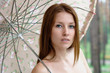 Beautiful young girl with parasol