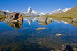 Matterhorn, Stelisee and two rocks Matterhorn, Stelisee and two rocks
