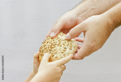 Photo: Sharing bread. Sharing bread.