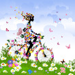 Girl on bike outdoors in summer