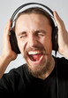 Foto: guy listening to the music and screaming guy listening to the music and screaming