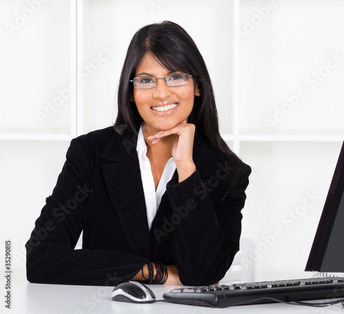 Photo: happy businesswoman in office happy businesswoman in office