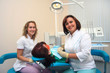 Young female patient takes a dental attendance