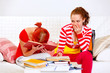 Two girlfriends tired while studying at home