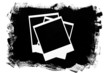 Photo frames over grunge black background