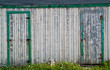 Closeup of an old white fishing shed