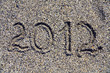 Inscription of year 2012 on sea coast Inscription of year 2012 on sea coast