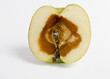 feculent apple rotten from the center - with clipping path