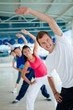 Gym group exercising